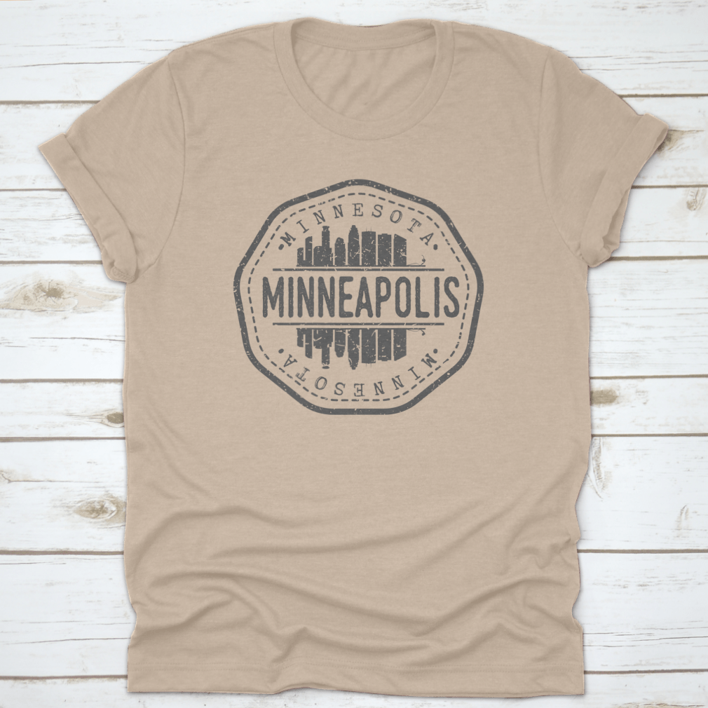 Minneapolis Skyline Stamp Postmark T-Shirt showcasing a silhouette design on a soft cotton fabric.