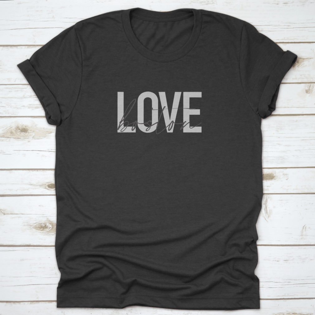 A stylish grey t-shirt featuring the phrase 'Love Boston' in modern graphic design, perfect for urban fashion lovers.