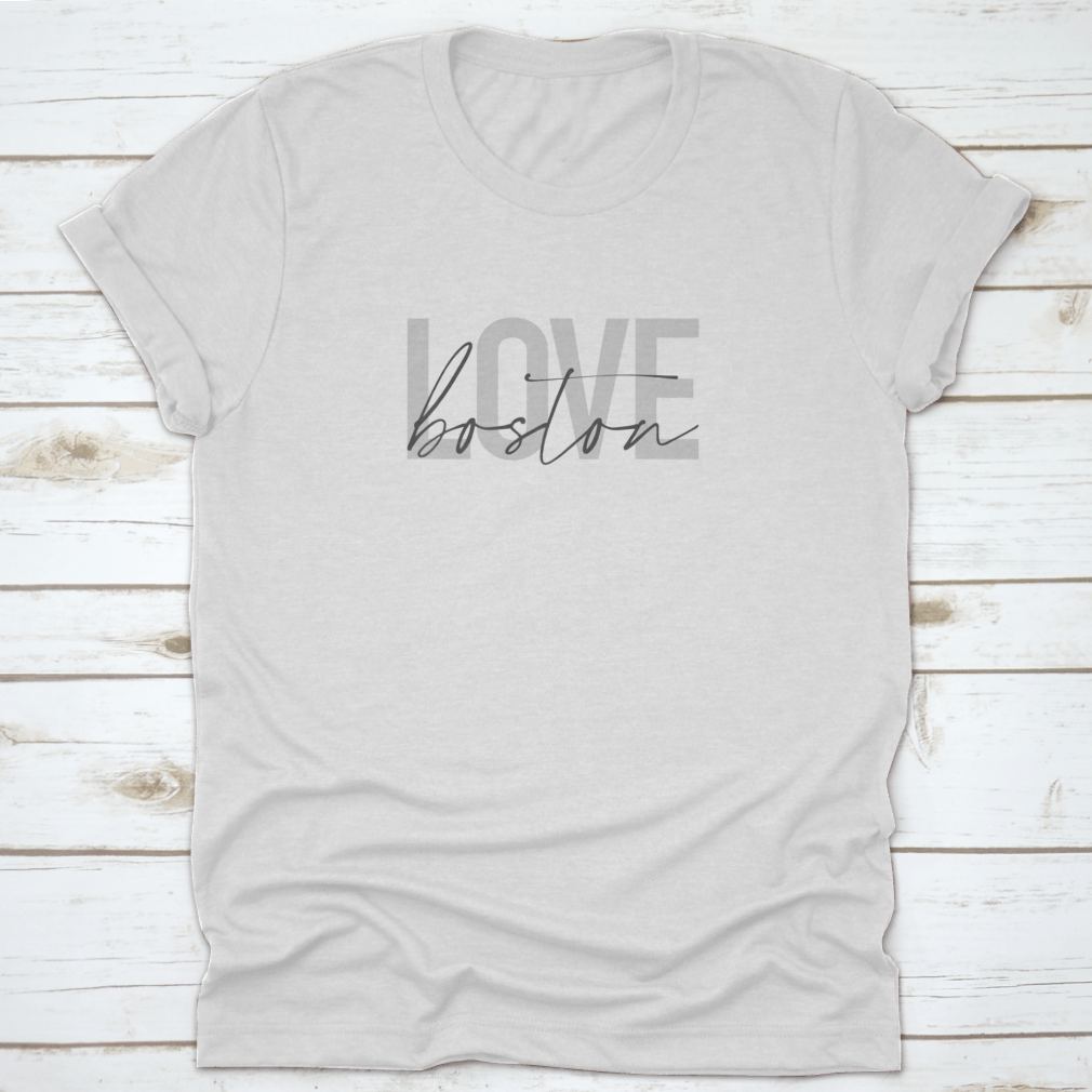 A stylish grey t-shirt featuring the phrase 'Love Boston' in modern graphic design, perfect for urban fashion lovers.