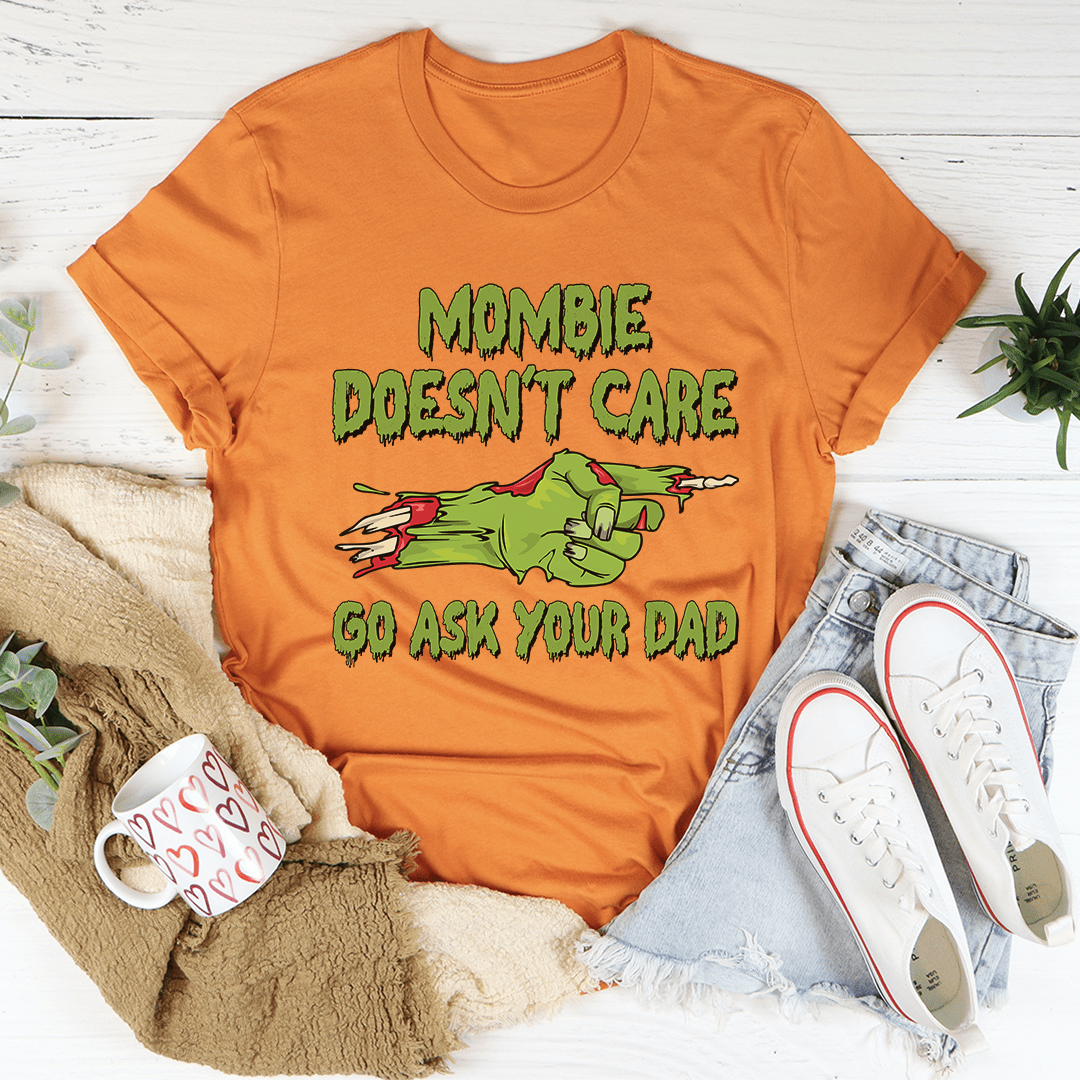 Mombie Doesn't Care Go Ask Your Dad Tee featuring a playful Halloween design on soft cotton fabric.