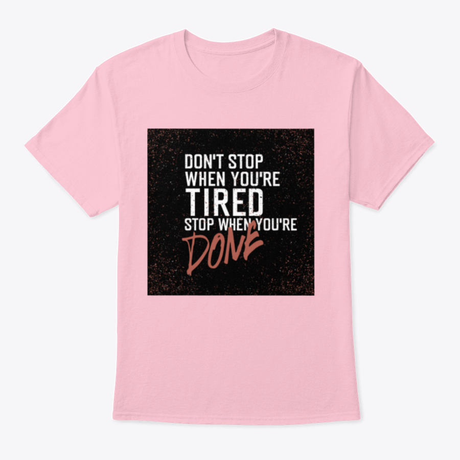 Motivational poster with the quote 'Don't Stop When You're Tired. Stop When You're Done.' displayed in a modern setting.