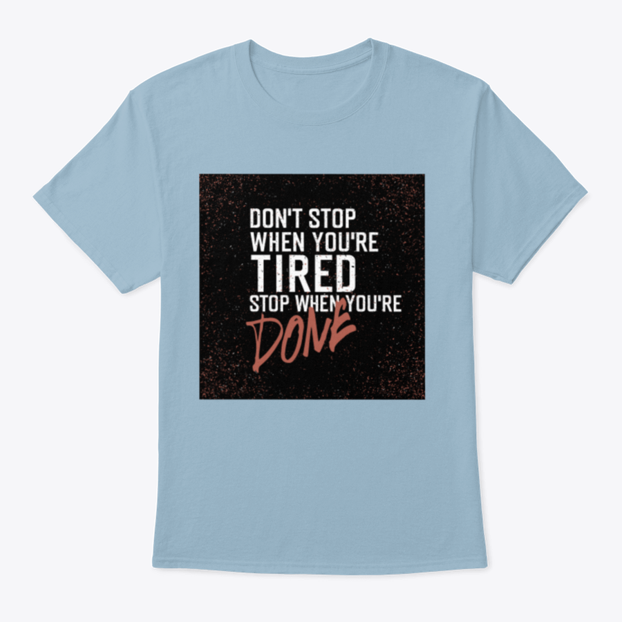 Motivational poster with the quote 'Don't Stop When You're Tired. Stop When You're Done.' displayed in a modern setting.