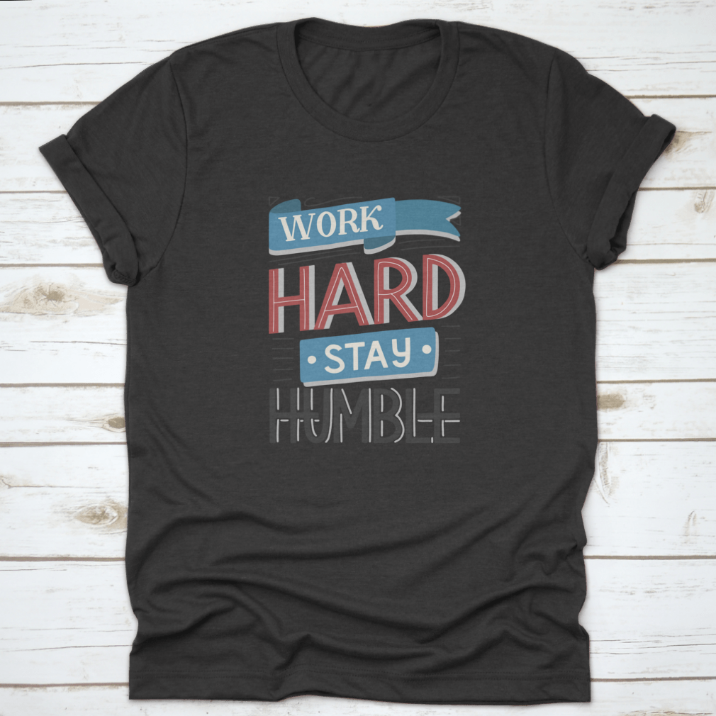 Motivational quotes apparel featuring 'Work Hard And Stay Humble' design, made from high-quality cotton fabric.