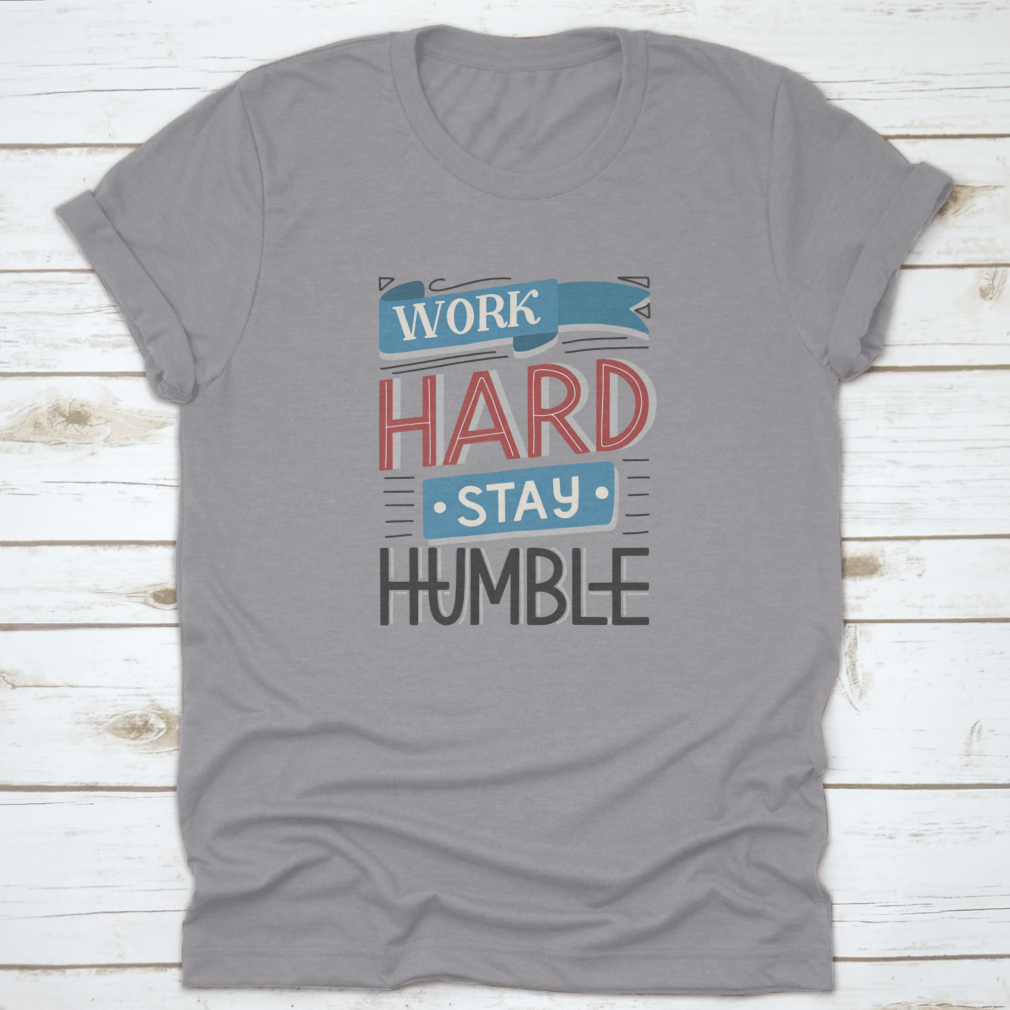 Motivational quotes apparel featuring 'Work Hard And Stay Humble' design, made from high-quality cotton fabric.