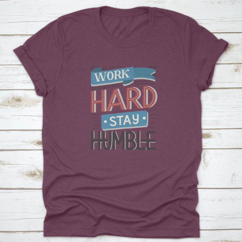 Motivational quotes apparel featuring 'Work Hard And Stay Humble' design, made from high-quality cotton fabric.