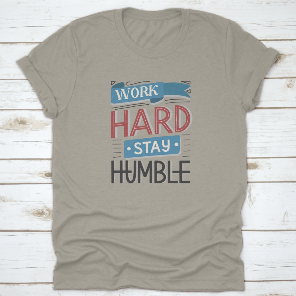 Motivational quotes apparel featuring 'Work Hard And Stay Humble' design, made from high-quality cotton fabric.