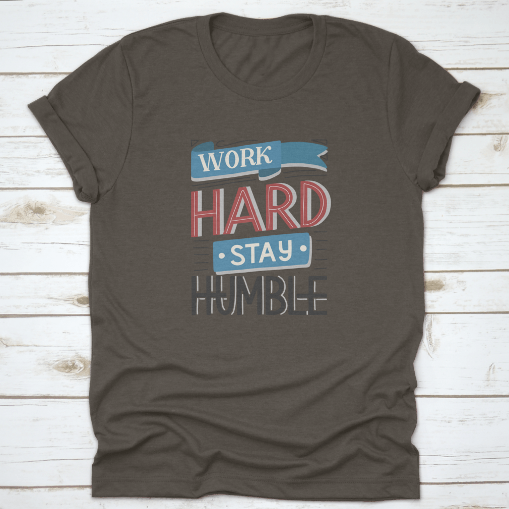 Motivational quotes apparel featuring 'Work Hard And Stay Humble' design, made from high-quality cotton fabric.