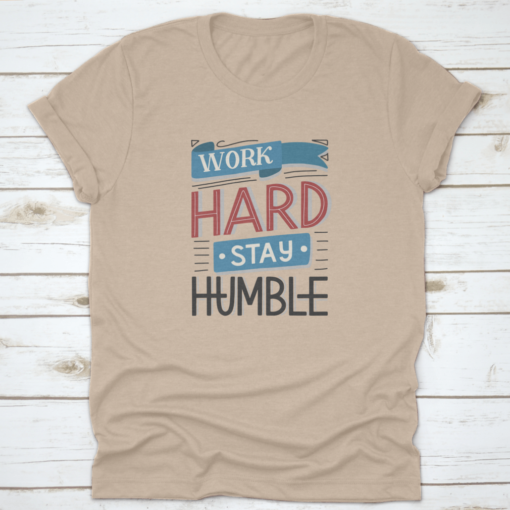 Motivational quotes apparel featuring 'Work Hard And Stay Humble' design, made from high-quality cotton fabric.