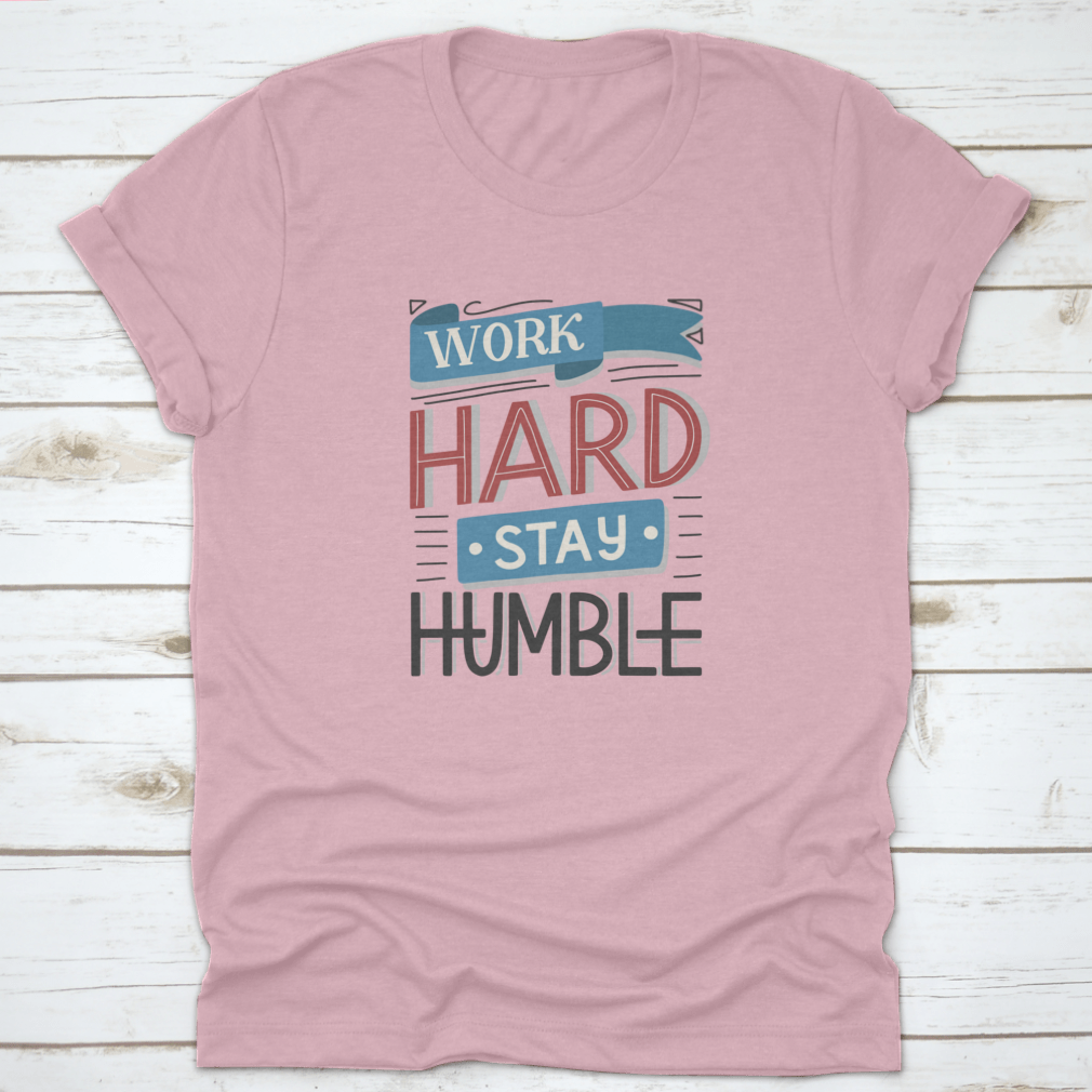 Motivational quotes apparel featuring 'Work Hard And Stay Humble' design, made from high-quality cotton fabric.
