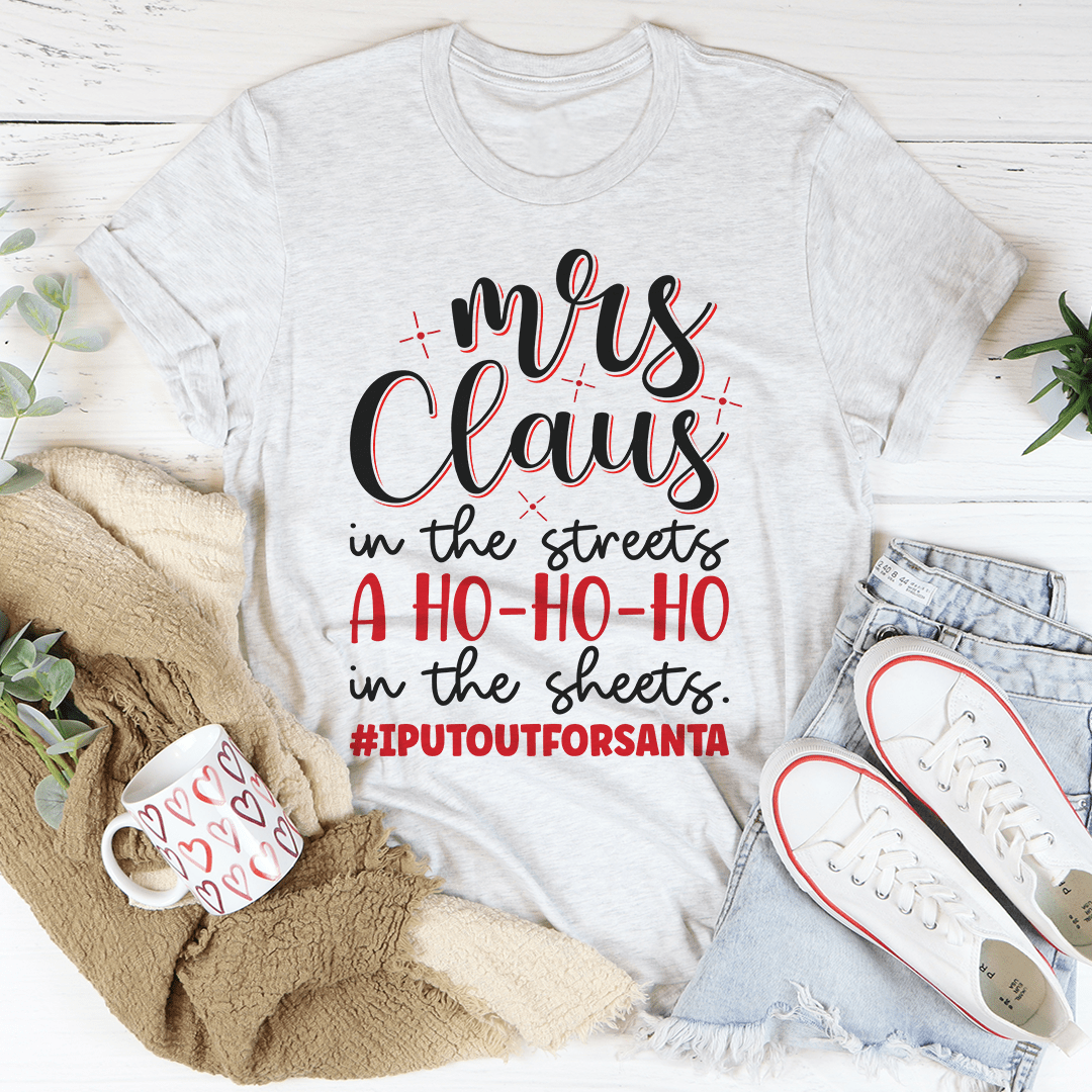 Mrs Claus Tee featuring a festive design, made from 100% soft cotton, perfect for holiday celebrations.