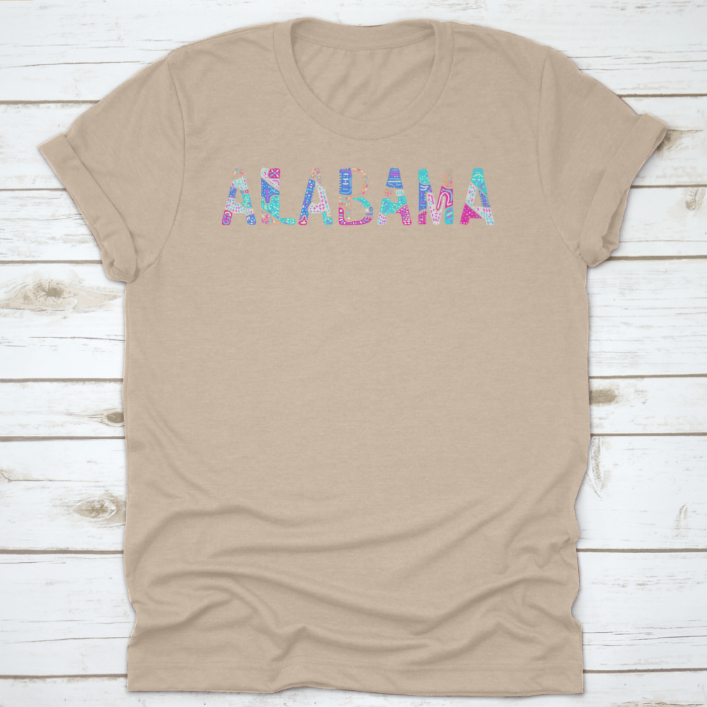 A colorful T-shirt featuring a bright doodle pattern with curves and crooked letters, showcasing a playful and artistic design.