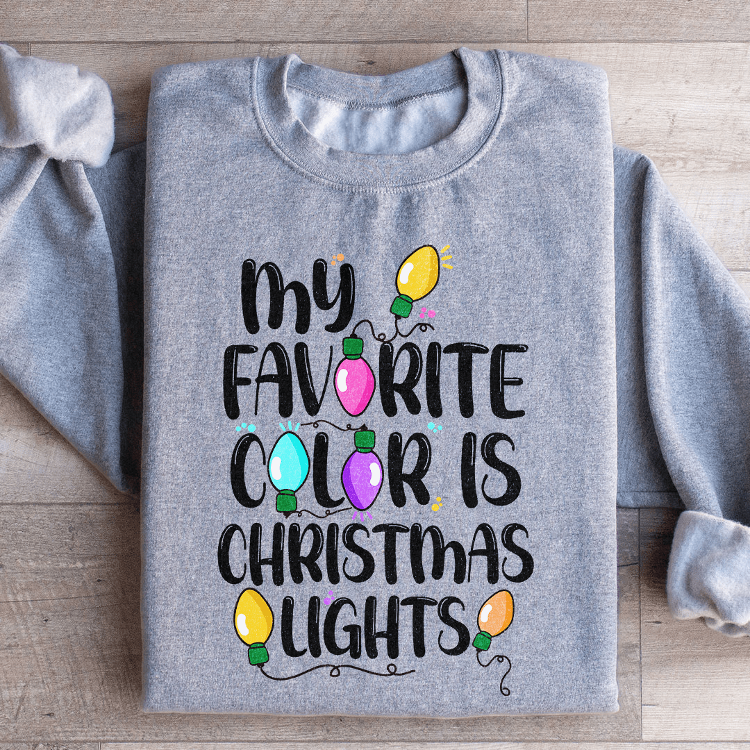 Cozy sweatshirt featuring a vibrant Christmas lights design, perfect for holiday celebrations.