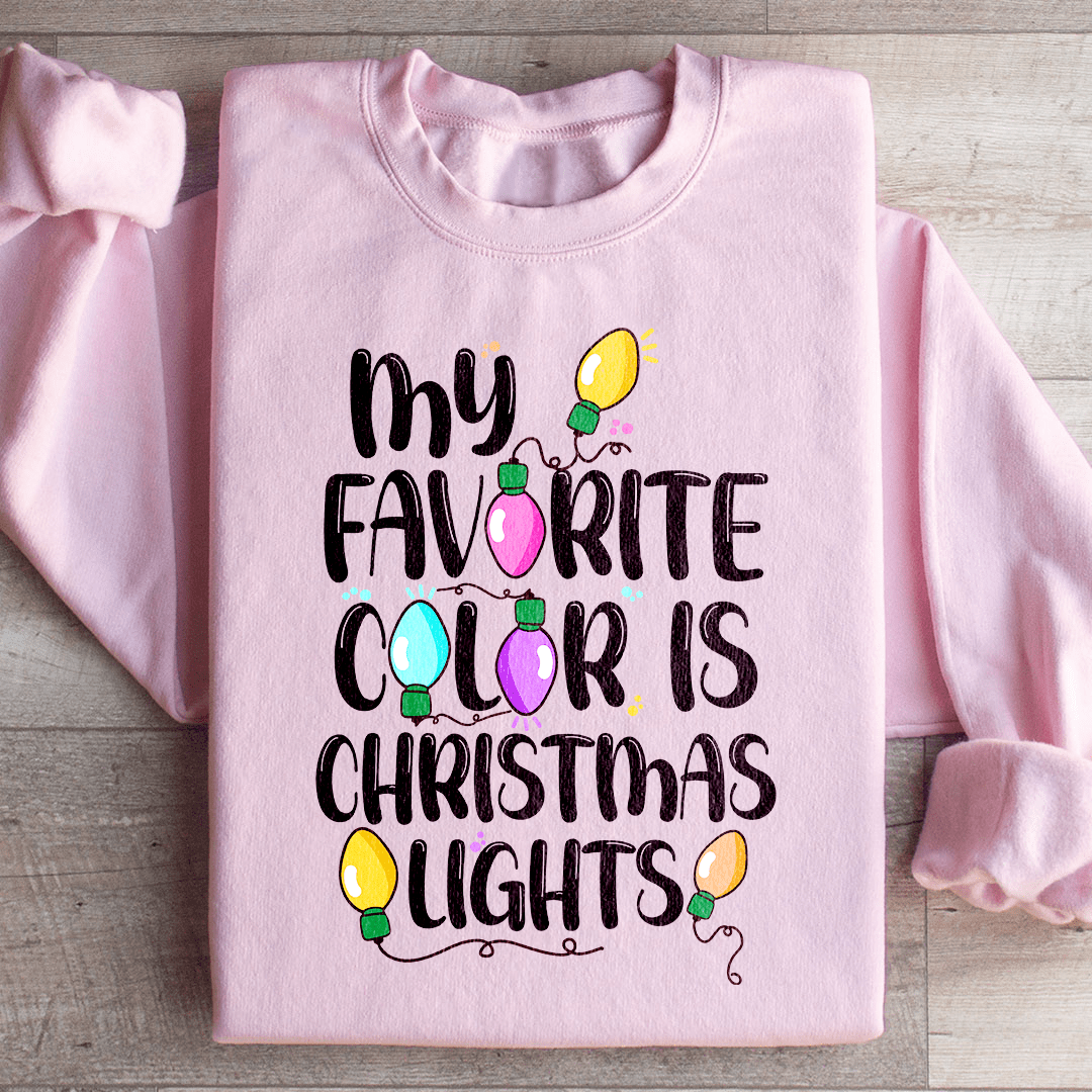 Cozy sweatshirt featuring a vibrant Christmas lights design, perfect for holiday celebrations.