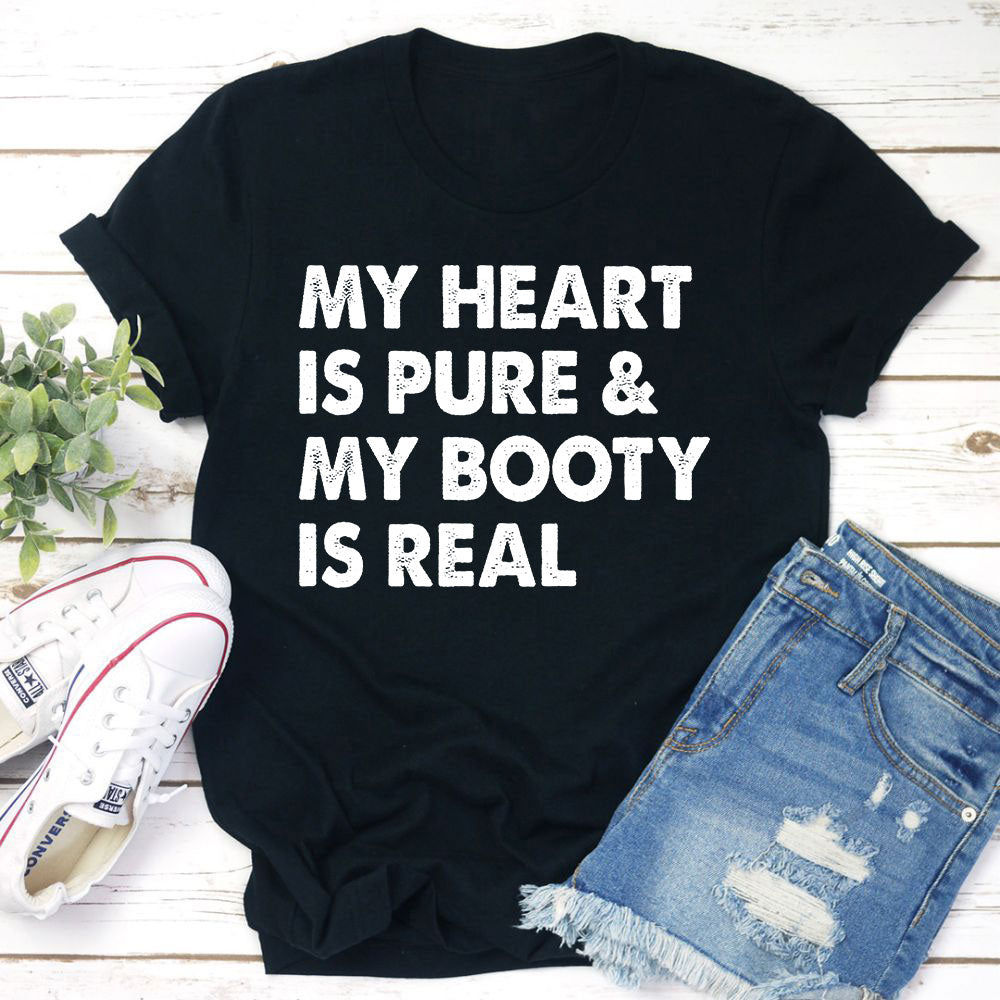 A stylish t-shirt featuring the phrase 'My Heart Is Pure & My Booty Is Real', made from soft cotton with double stitching.