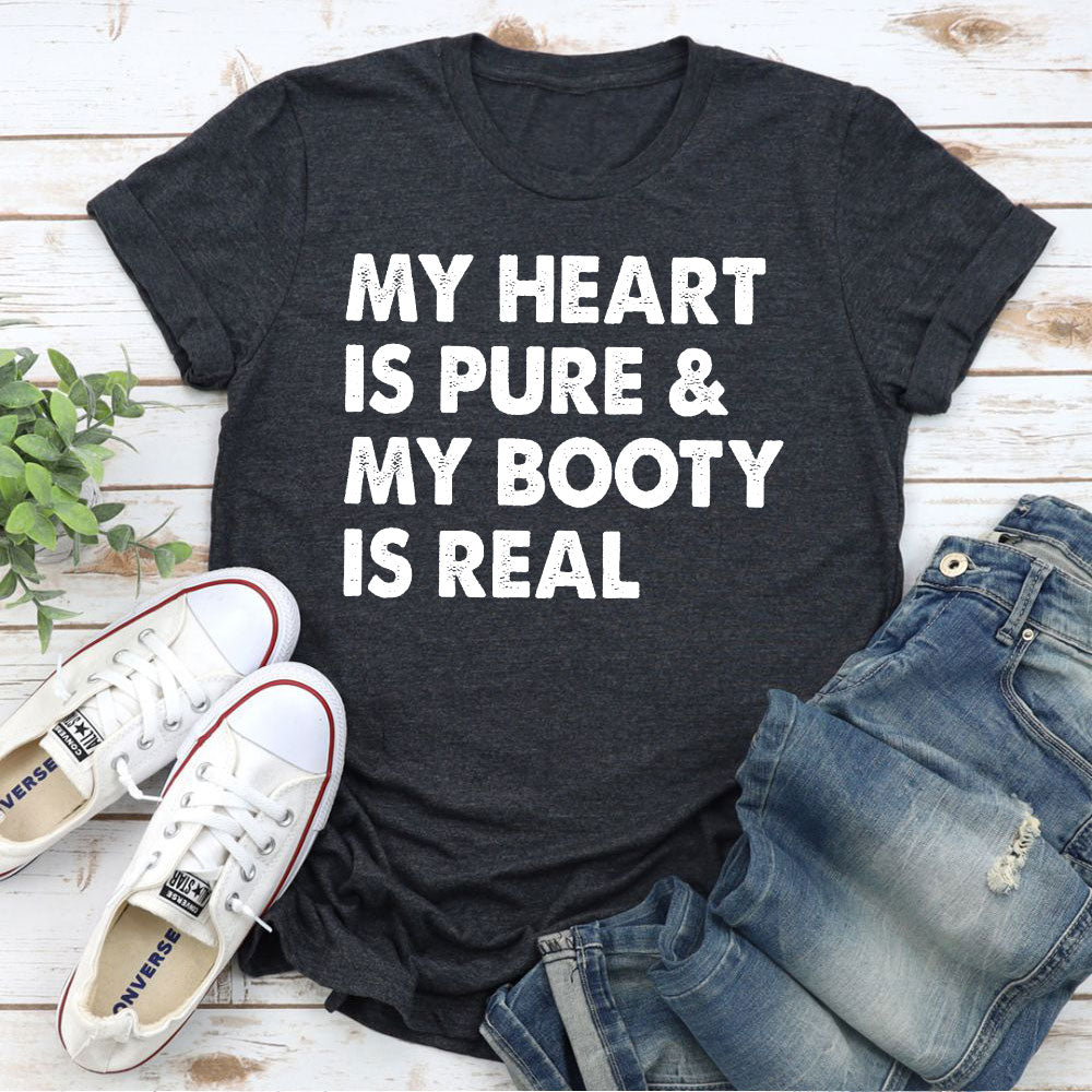 A stylish t-shirt featuring the phrase 'My Heart Is Pure & My Booty Is Real', made from soft cotton with double stitching.