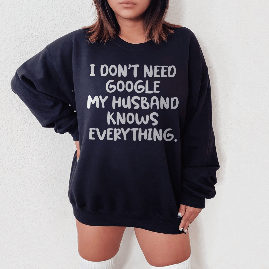 Cozy 'My Husband Knows Everything' sweatshirt featuring a unique design by top artists, made from a cotton/poly fleece blend.