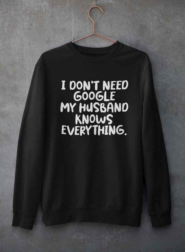 My Husband Knows Everything Sweat Shirt in a cozy cotton/poly fleece blend, featuring adjustable banded cuffs for warmth.