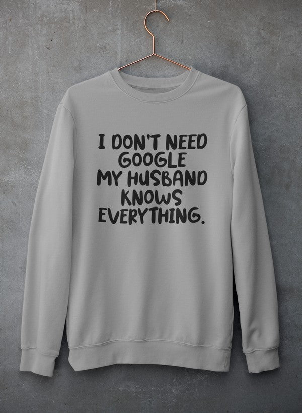 My Husband Knows Everything Sweat Shirt in a cozy cotton/poly fleece blend, featuring adjustable banded cuffs for warmth.