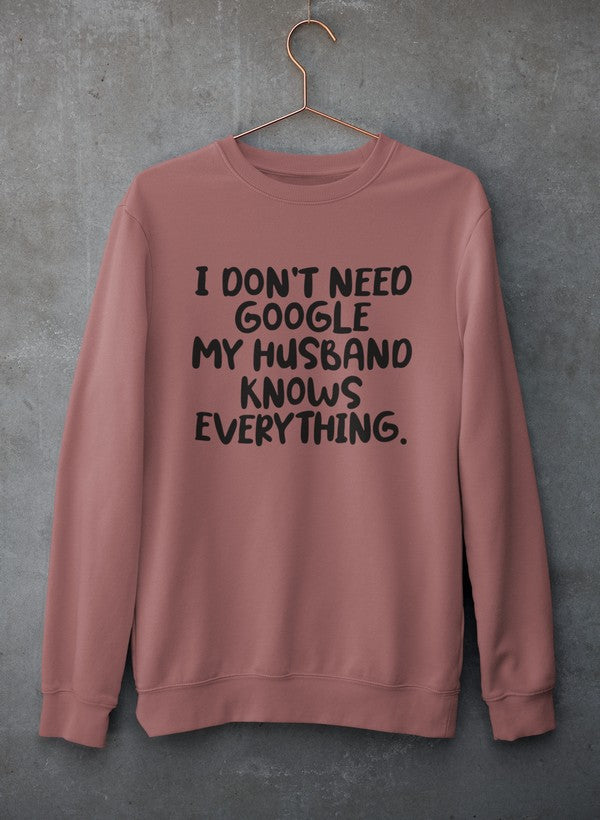 My Husband Knows Everything Sweat Shirt in a cozy cotton/poly fleece blend, featuring adjustable banded cuffs for warmth.