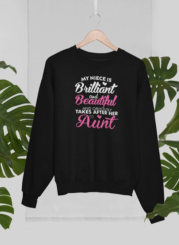 Cozy sweatshirt featuring a vibrant design celebrating brilliance and beauty, perfect for young girls.