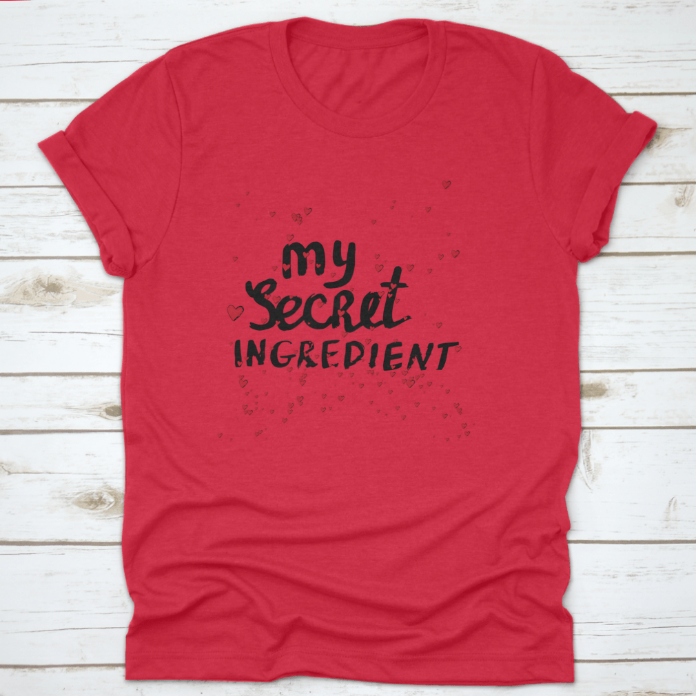 A stylish white shirt featuring hand lettering with red hearts, showcasing a unique and playful design.