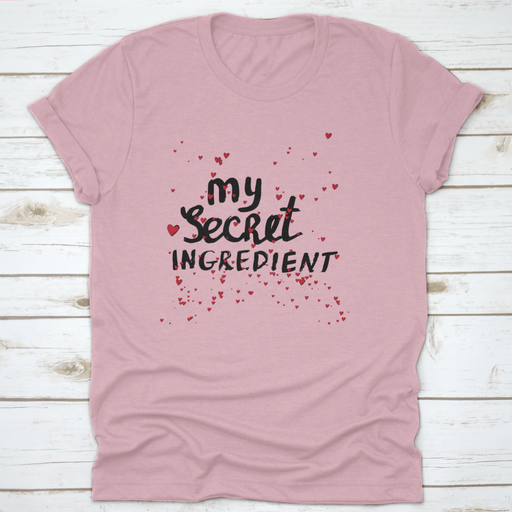A stylish white shirt featuring hand lettering with red hearts, showcasing a unique and playful design.