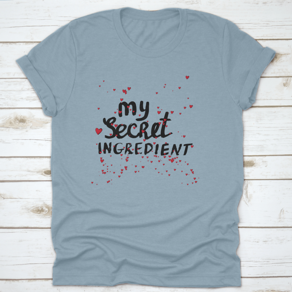 A stylish white shirt featuring hand lettering with red hearts, showcasing a unique and playful design.