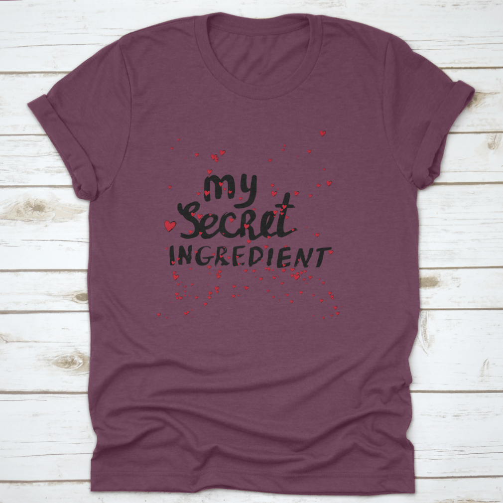 A stylish white shirt featuring hand lettering with red hearts, showcasing a unique and playful design.