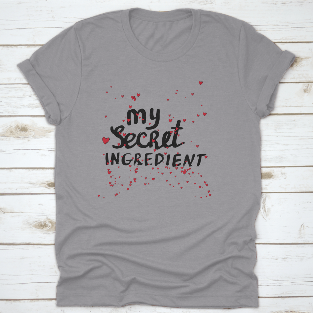 A stylish white shirt featuring hand lettering with red hearts, showcasing a unique and playful design.