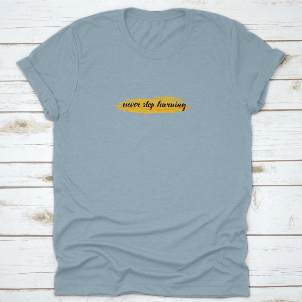 A motivational t-shirt featuring the quote 'Never Stop Learning' designed for comfort and style, made from high-quality cotton.