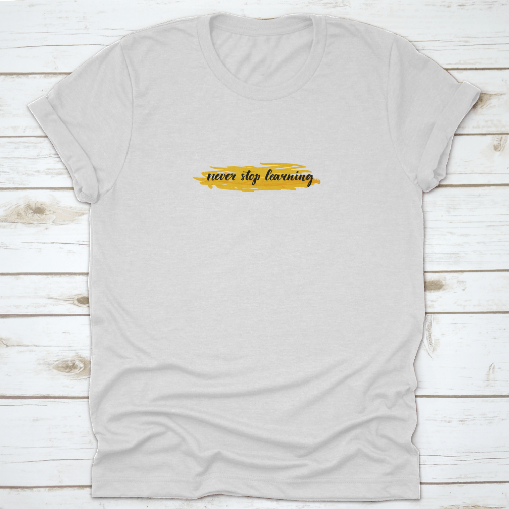 A motivational t-shirt featuring the quote 'Never Stop Learning' designed for comfort and style, made from high-quality cotton.