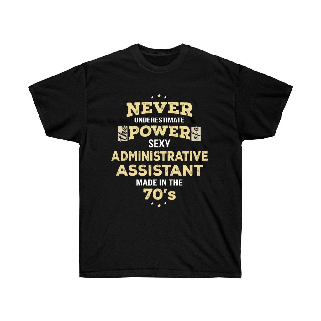 A stylish unisex t-shirt featuring the phrase 'Never Underestimate Administrative Assistant Made In The 70s' in vibrant vinyl print.