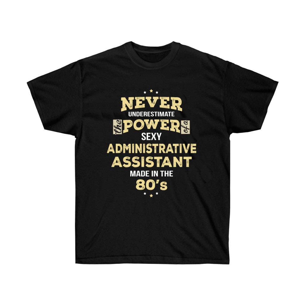 A stylish unisex t-shirt featuring the phrase 'Never Underestimate Administrative Assistant Made In The 80s' in vibrant vinyl print.