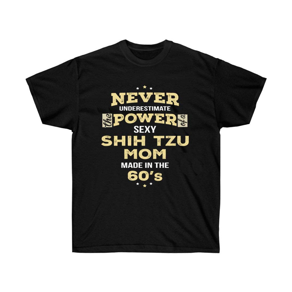 A stylish unisex t-shirt featuring the phrase 'Never Underestimate Shih Tzu Mom Made In The 60s' with a vibrant vinyl print.