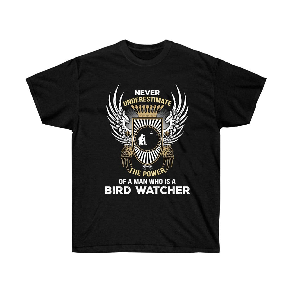 A stylish unisex t-shirt featuring the phrase 'Never Underestimate The Power Of A Bird Watcher' printed in vibrant vinyl on soft cotton fabric.