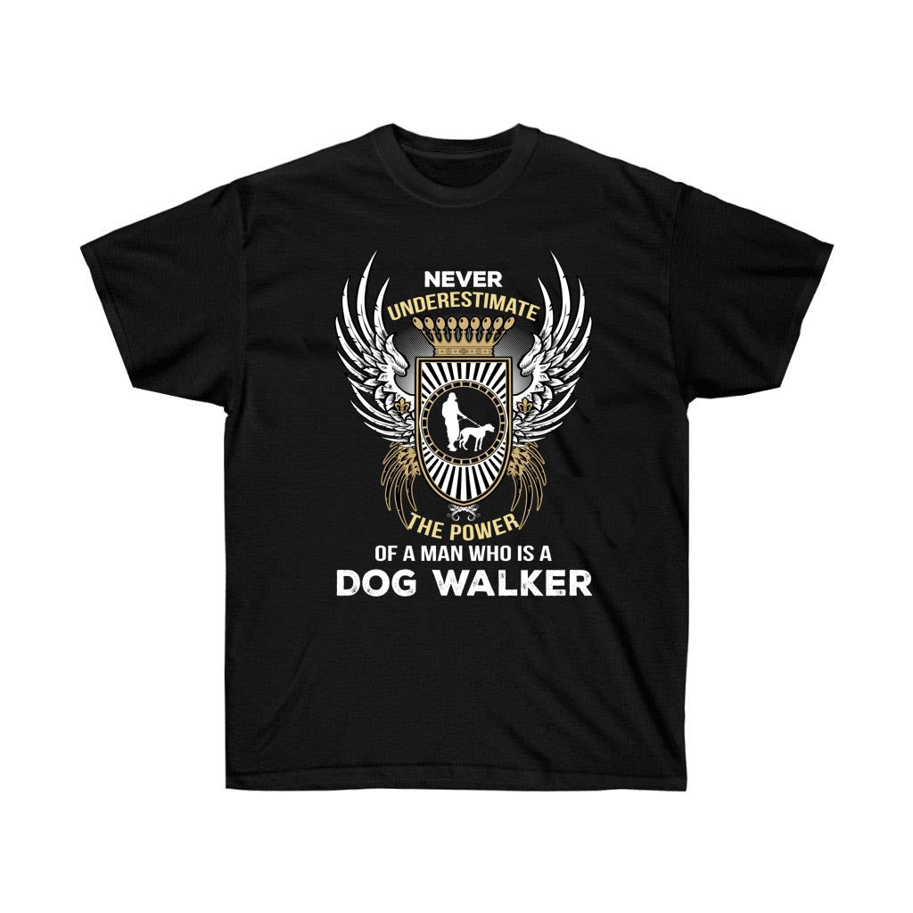 A comfortable unisex t-shirt featuring the phrase 'Never Underestimate The Power Of A Dog Walker' printed in bold vinyl on soft cotton fabric.