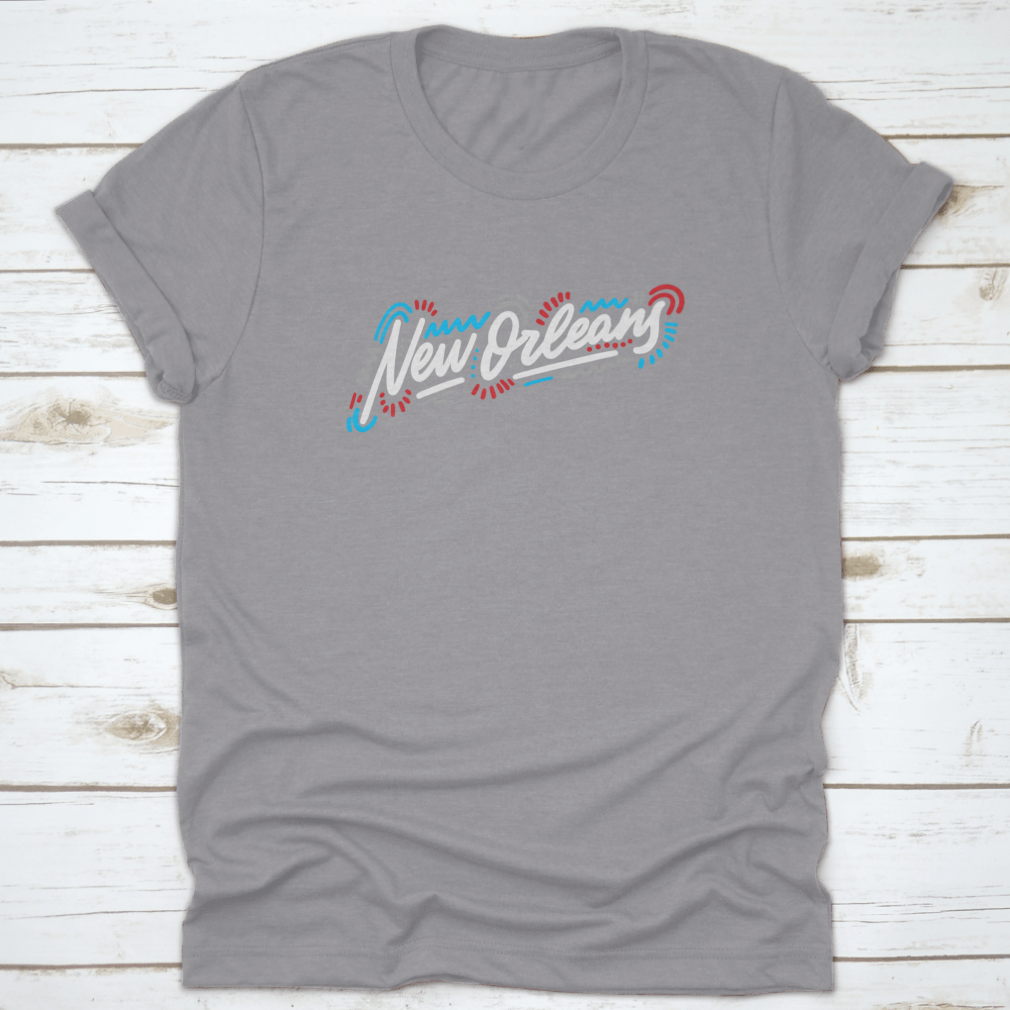 A stylish t-shirt featuring the handwritten city name 'New Orleans' in modern calligraphy, showcasing artistic lettering on a comfortable fabric.