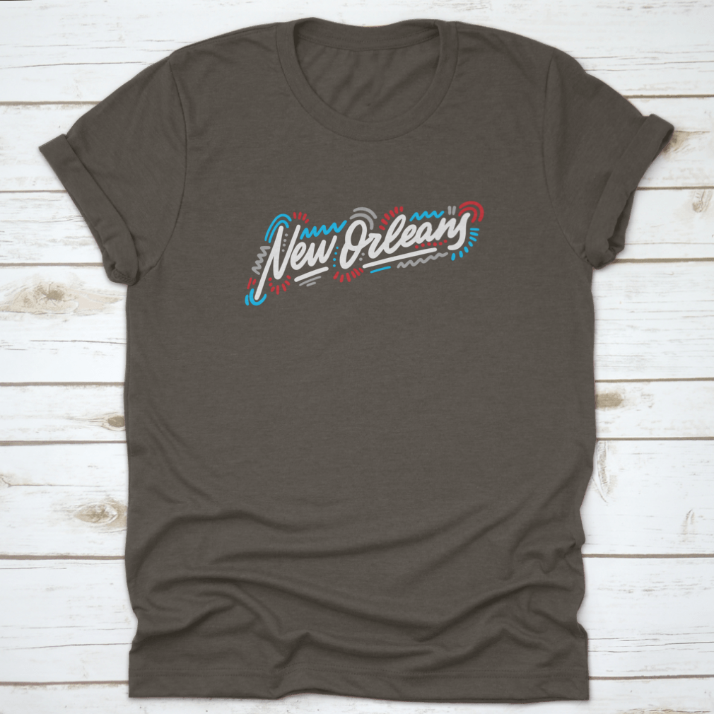 A stylish t-shirt featuring the handwritten city name 'New Orleans' in modern calligraphy, showcasing artistic lettering on a comfortable fabric.