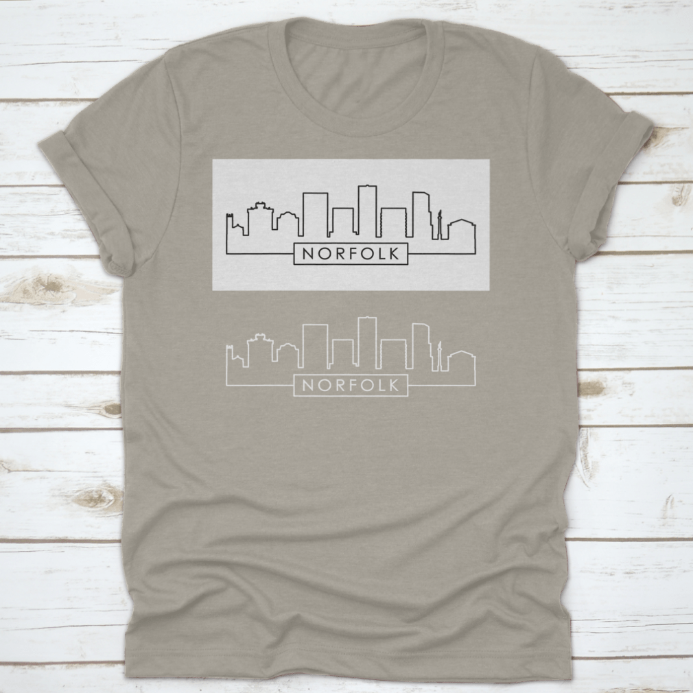 A stylish shirt featuring a linear vector illustration of the Norfolk city skyline, made from 100% cotton for comfort.