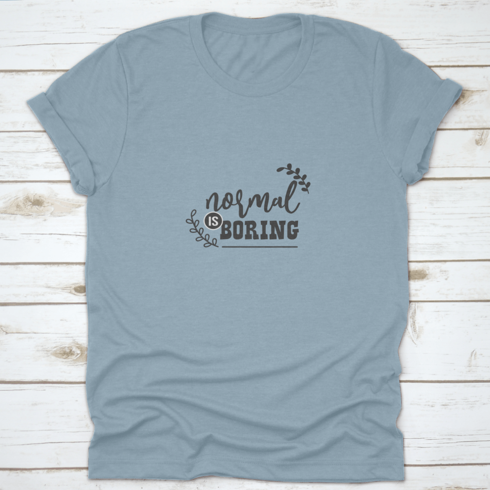 A stylish 'Normal Is Boring' fashion shirt made from 100% cotton, showcasing a classic fit and midweight fabric, perfect for casual wear or custom printing.