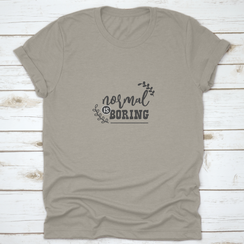 A stylish 'Normal Is Boring' fashion shirt made from 100% cotton, showcasing a classic fit and midweight fabric, perfect for casual wear or custom printing.