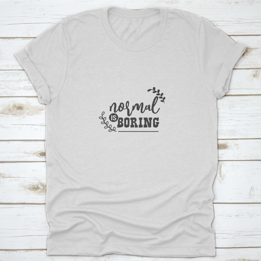 A stylish 'Normal Is Boring' fashion shirt made from 100% cotton, showcasing a classic fit and midweight fabric, perfect for casual wear or custom printing.