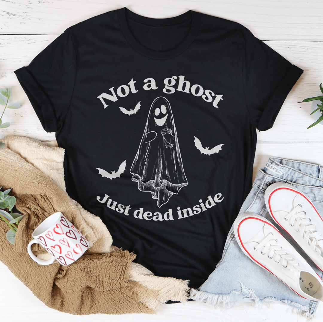 A black Halloween tee featuring the phrase 'Not A Ghost Just Dead Inside' in spooky font, made from 100% soft cotton.