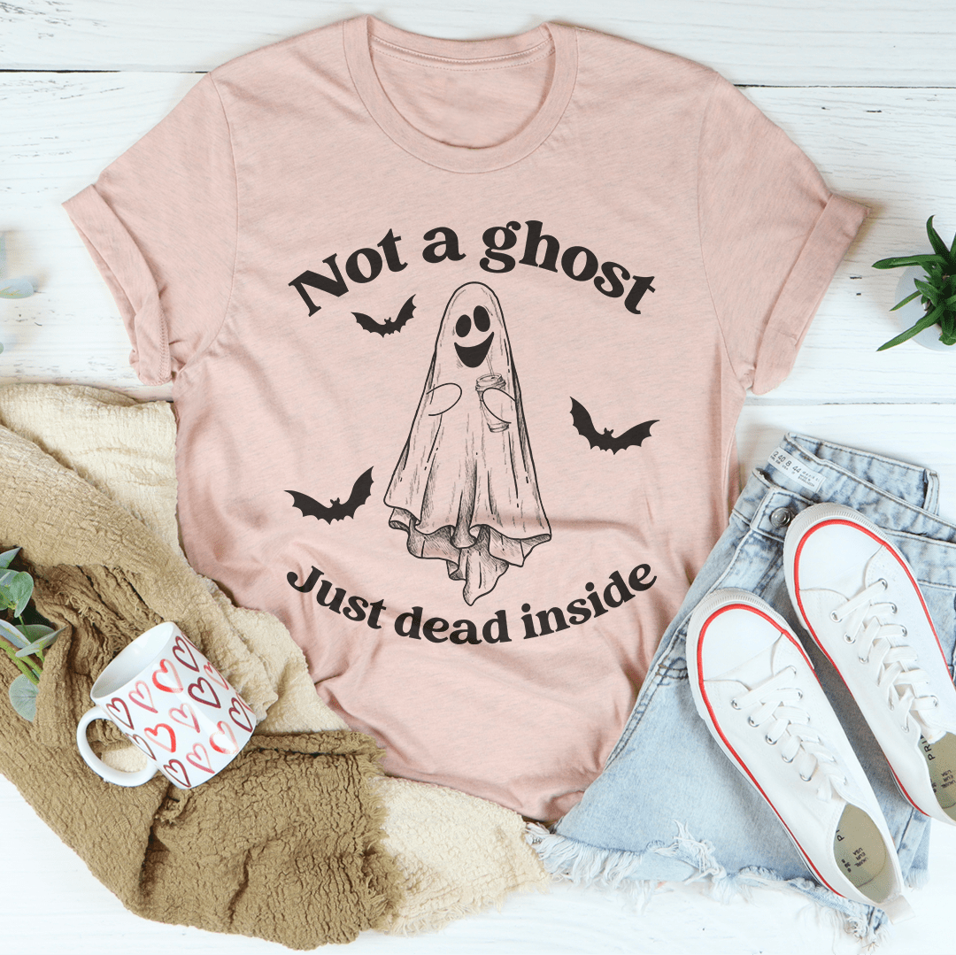 A black Halloween tee featuring the phrase 'Not A Ghost Just Dead Inside' in spooky font, made from 100% soft cotton.