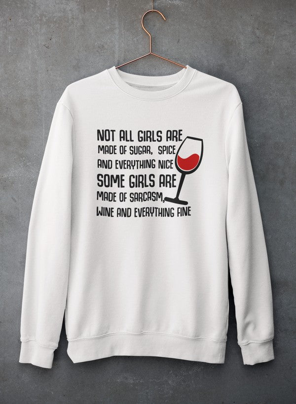 A stylish sweatshirt featuring the phrase 'Not All Girls Are Made Of Sugar And Spice And Everything Nice', designed for comfort and warmth.