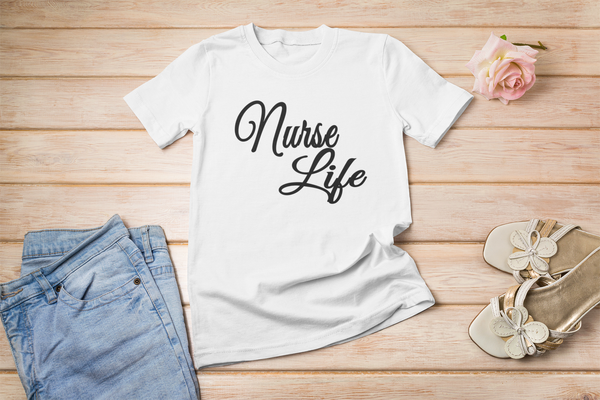 A stylish unisex Nurse Life Lettering T-shirt featuring a modern retail fit, perfect for nurses.