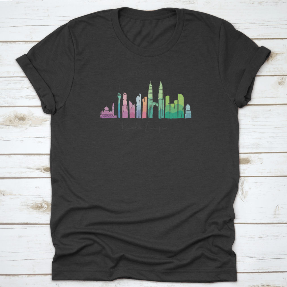 A stylish t-shirt featuring a minimalist single line drawing of the Kuala Lumpur city skyline, showcasing iconic buildings.
