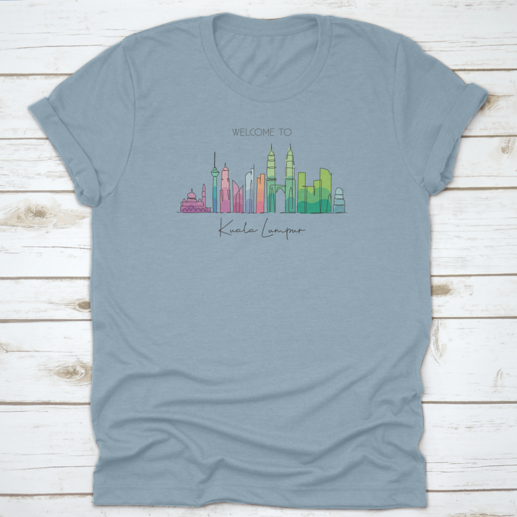 A stylish t-shirt featuring a minimalist single line drawing of the Kuala Lumpur city skyline, showcasing iconic buildings.