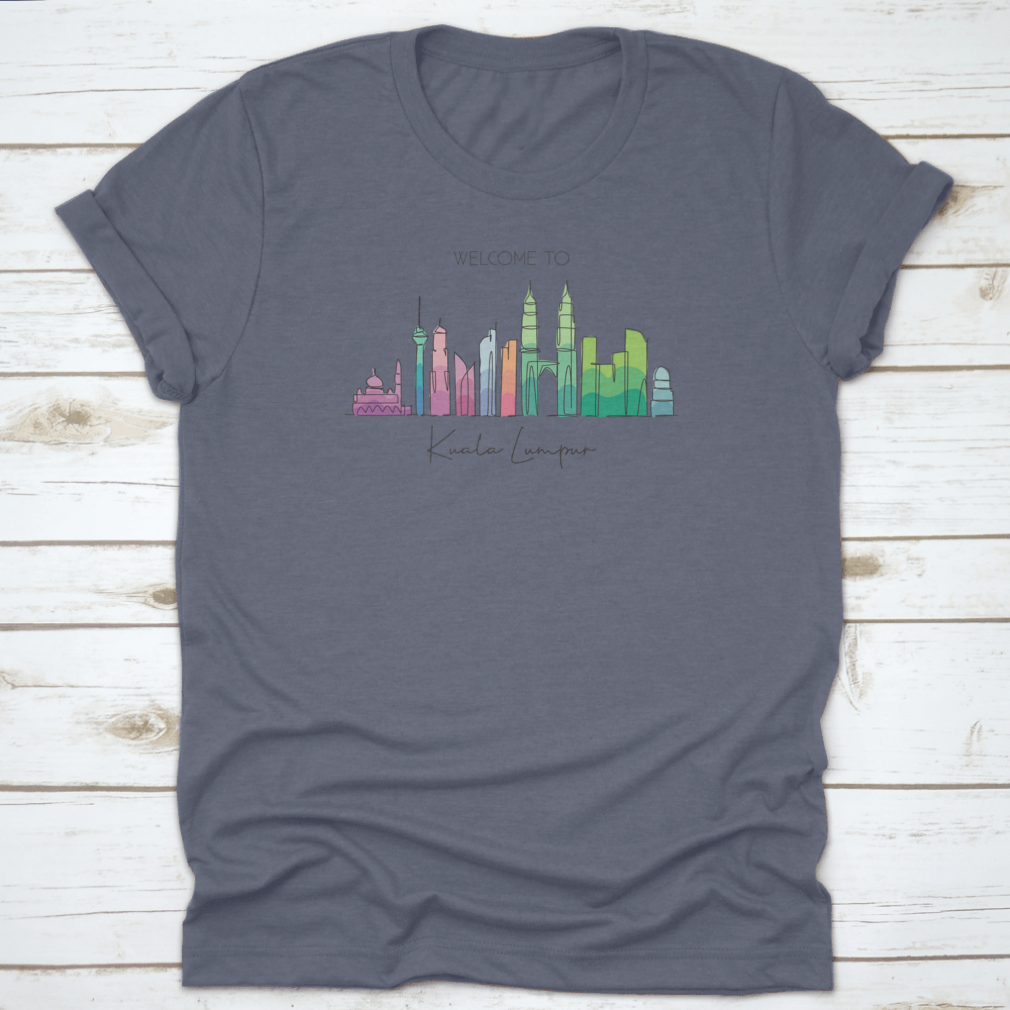 A stylish t-shirt featuring a minimalist single line drawing of the Kuala Lumpur city skyline, showcasing iconic buildings.