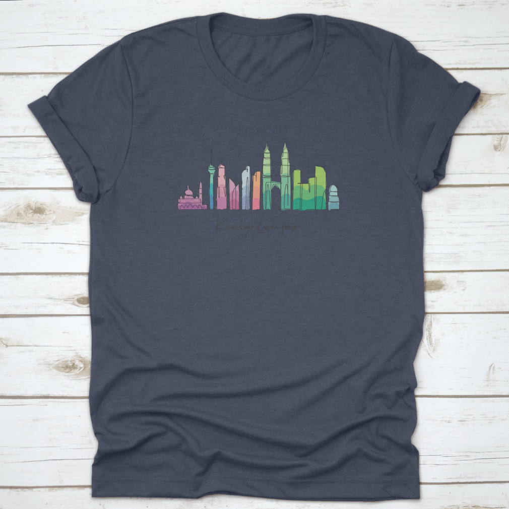 A stylish t-shirt featuring a minimalist single line drawing of the Kuala Lumpur city skyline, showcasing iconic buildings.
